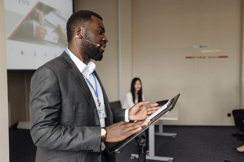 Executive talking at a conference