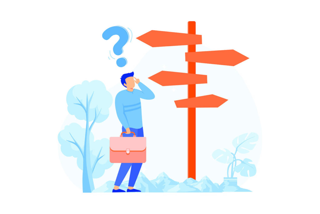 A man look at directional signs