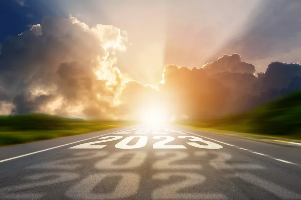 2023 road leading to a sunny horizon
