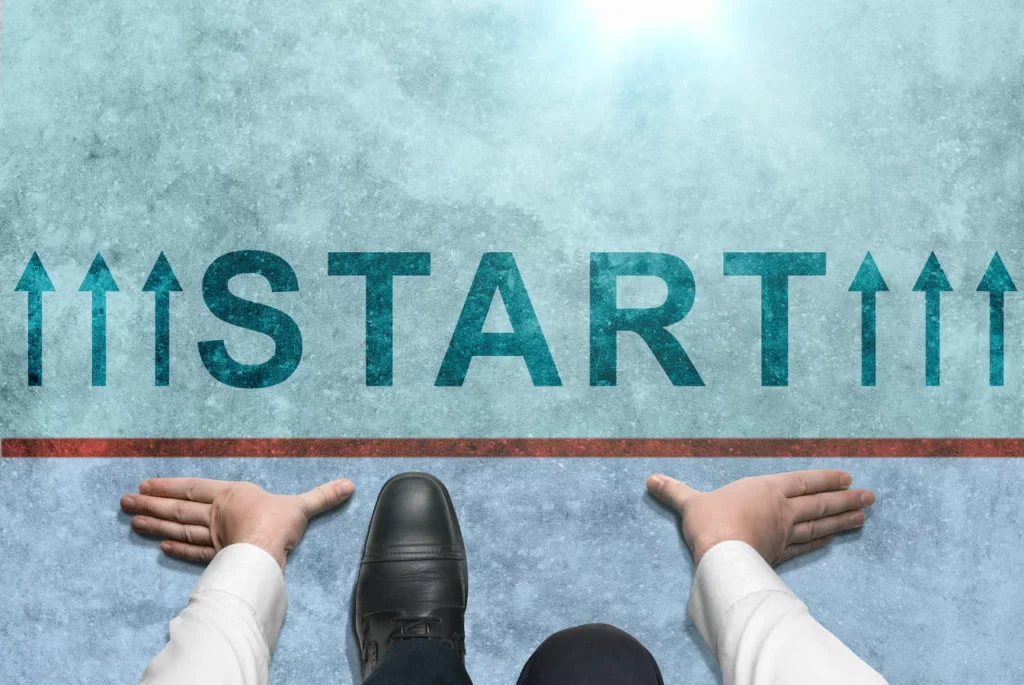 A person getting ready to run at the starting line of a race